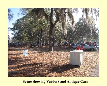 Scene showing Vendors and Antique Cars