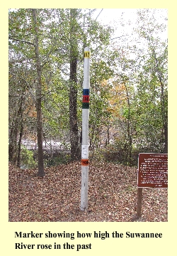 Marker showing how high the Suwannee River rose in the past